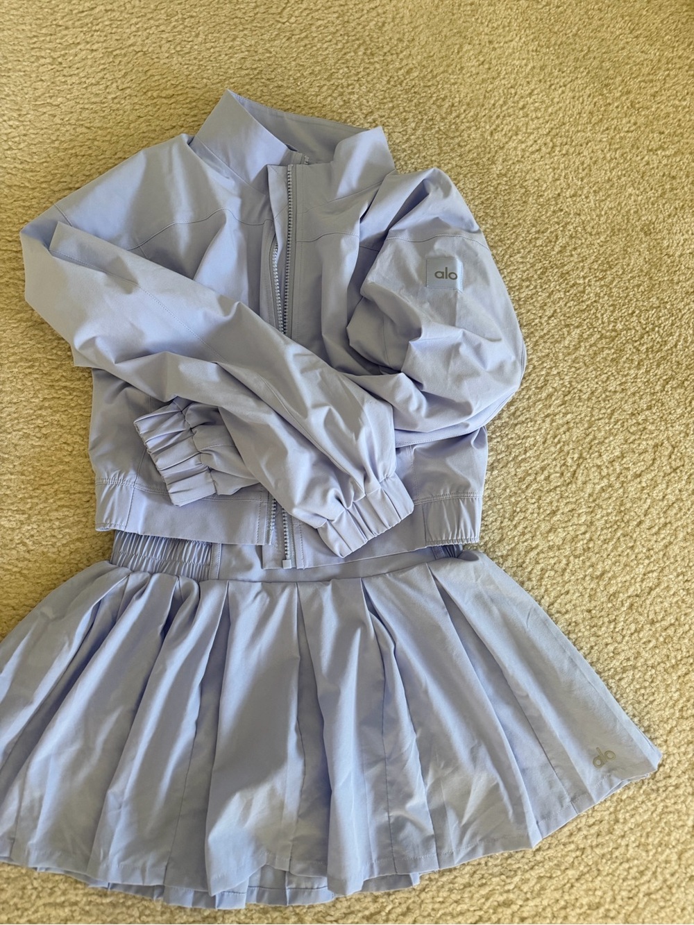 ALO rally tennis skirt and clubhouse jacket Provence blue